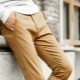 Pantalones de hombre beige: descripción de estilos y reglas de combinación.